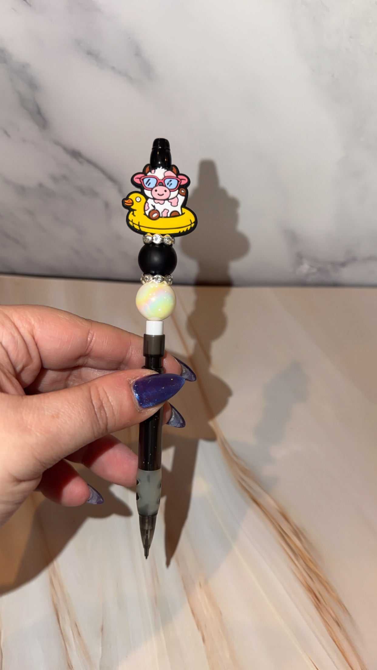 Mechanical pencil decorated with shimmering rhinestones and colorful beads for stylish writing