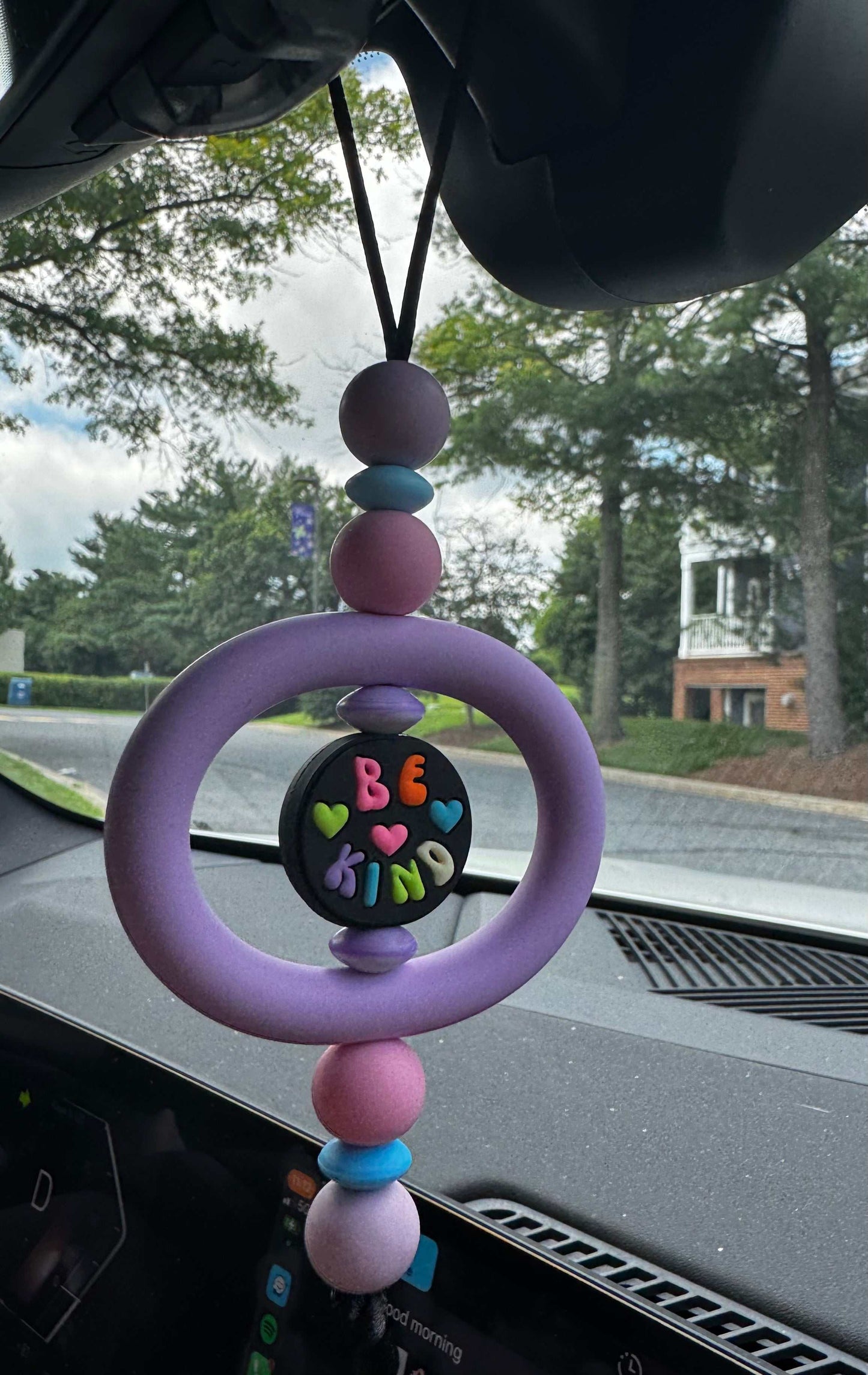 Elephant car charm with black nylon string and silicone beads hanging on car mirror