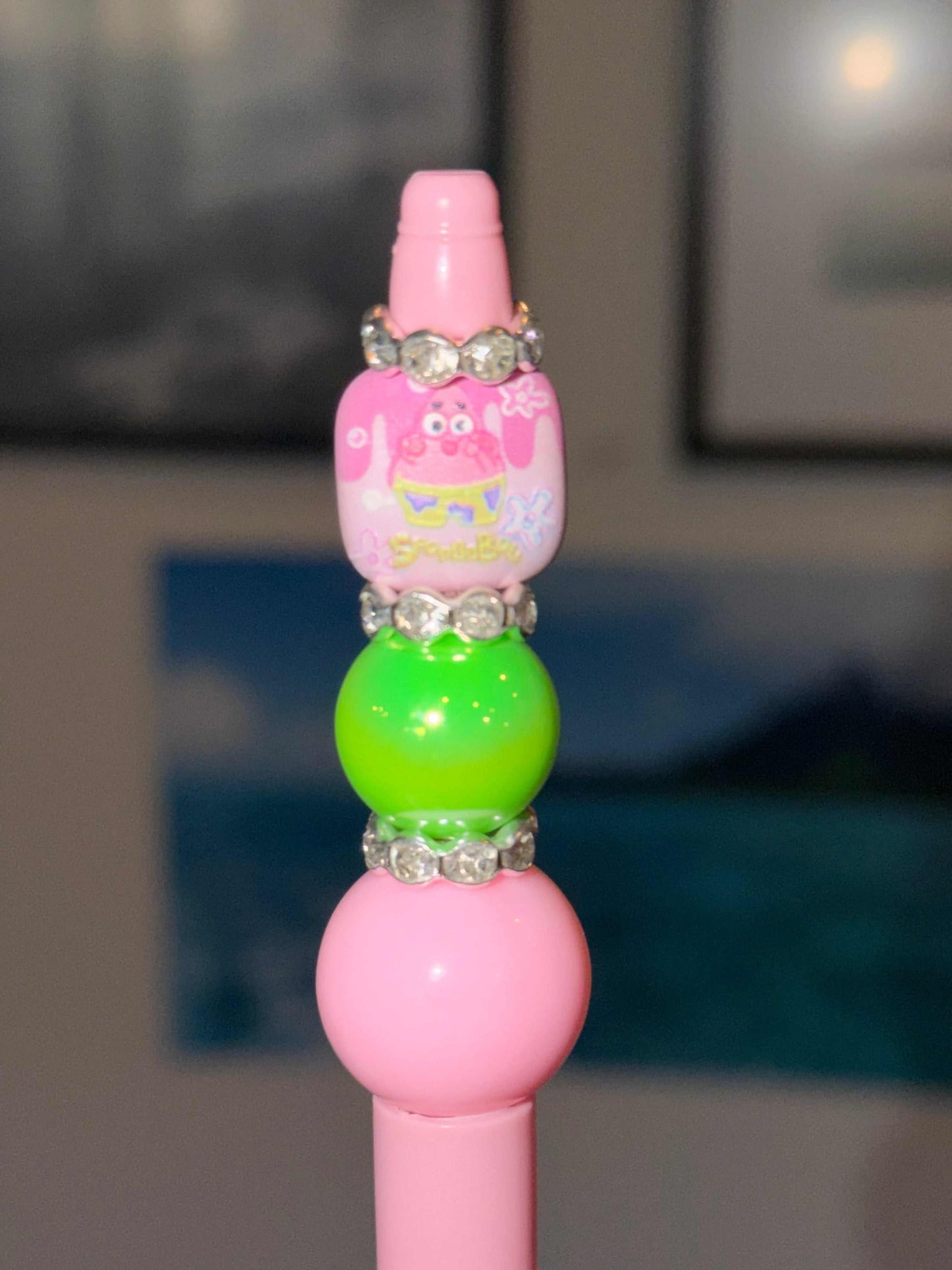 Pink and green kawaii starfish beaded pen with pastel cartoon design and rhinestone accents