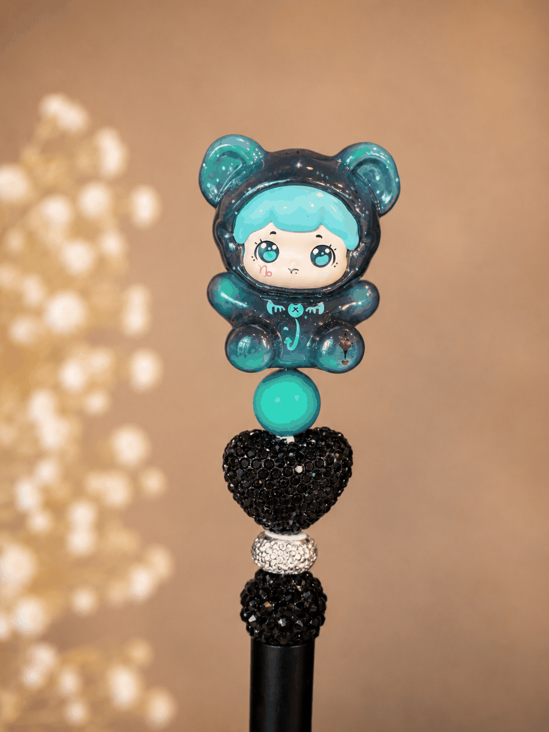 Handmade Cosmic Bear Pop Bean Beaded Pen with galaxy design and black crystal heart accent