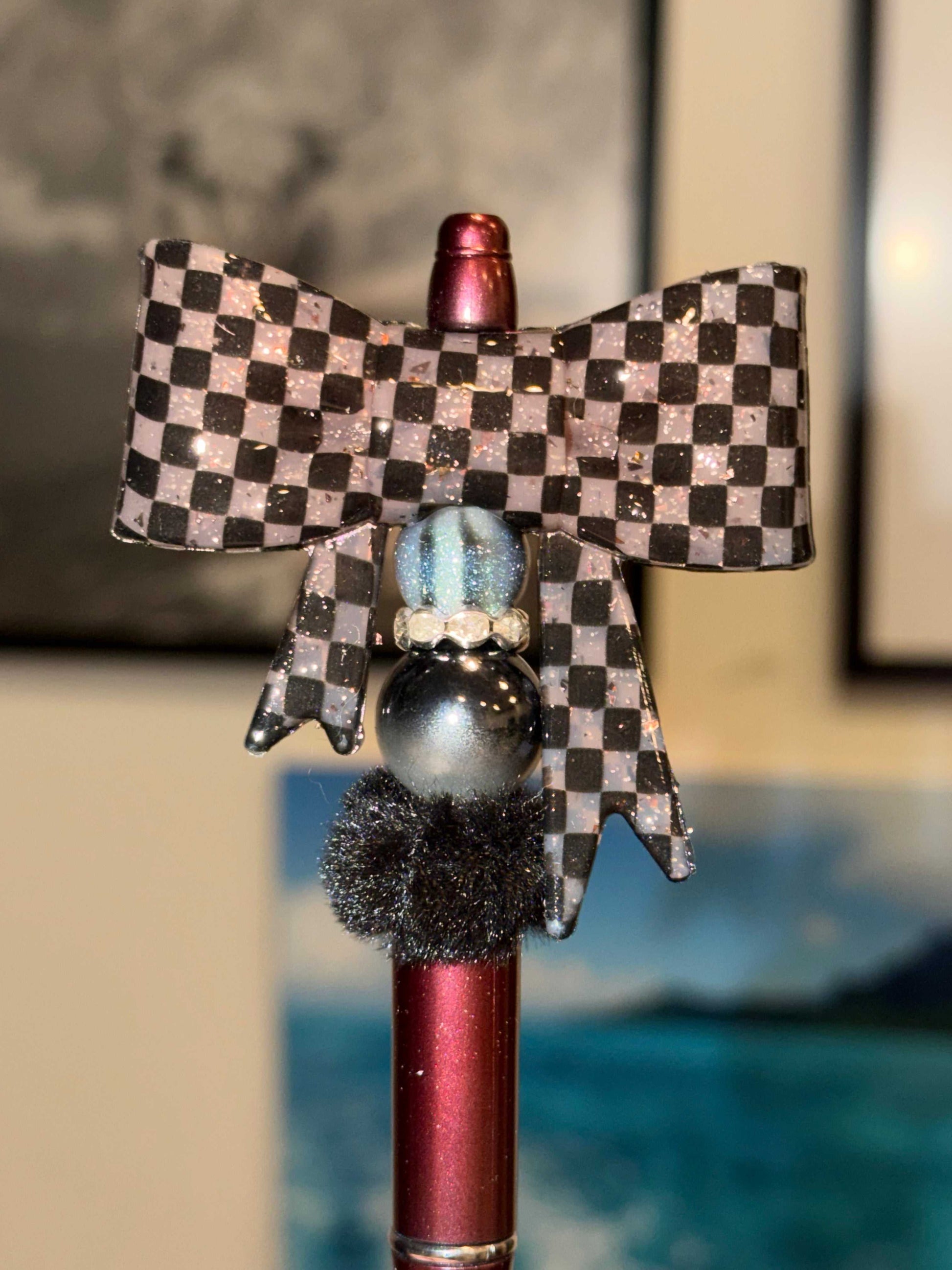 Checkered bow beaded pen with burgundy glitter barrel and black white glitter bow topper