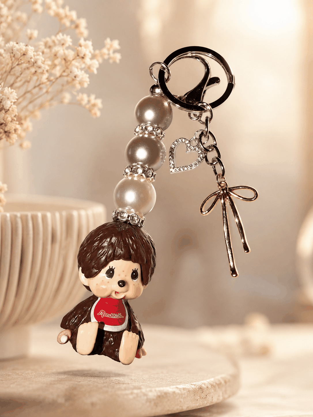 Authentic Monchhichi beaded bag charm with pearl beads, rhinestone spacers, silver heart, and bow charms on keychain