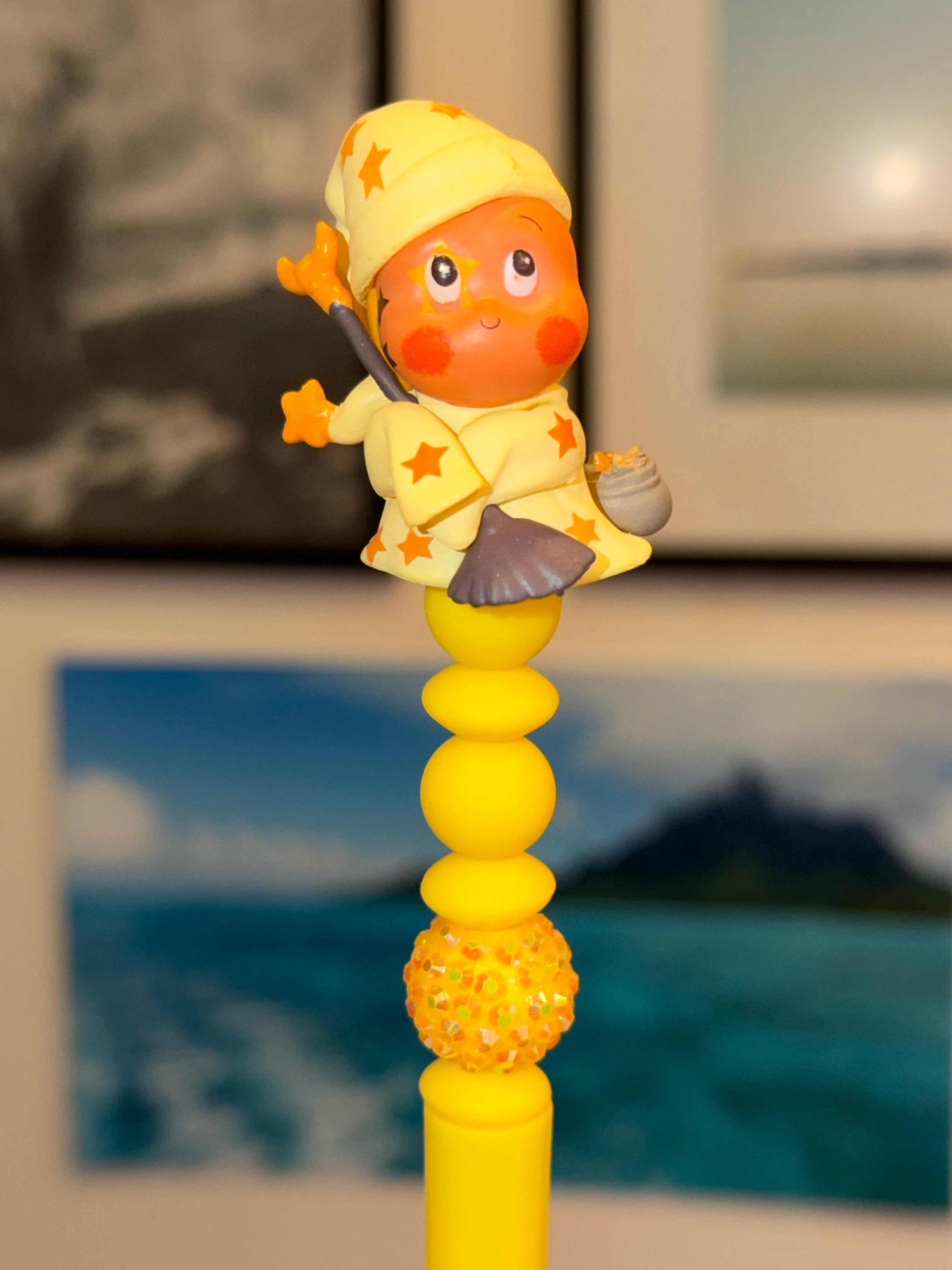 Yellow Twinkle Twinkle Pop Bean star witch beaded pen with kawaii collectible figure topper and matte globe beads