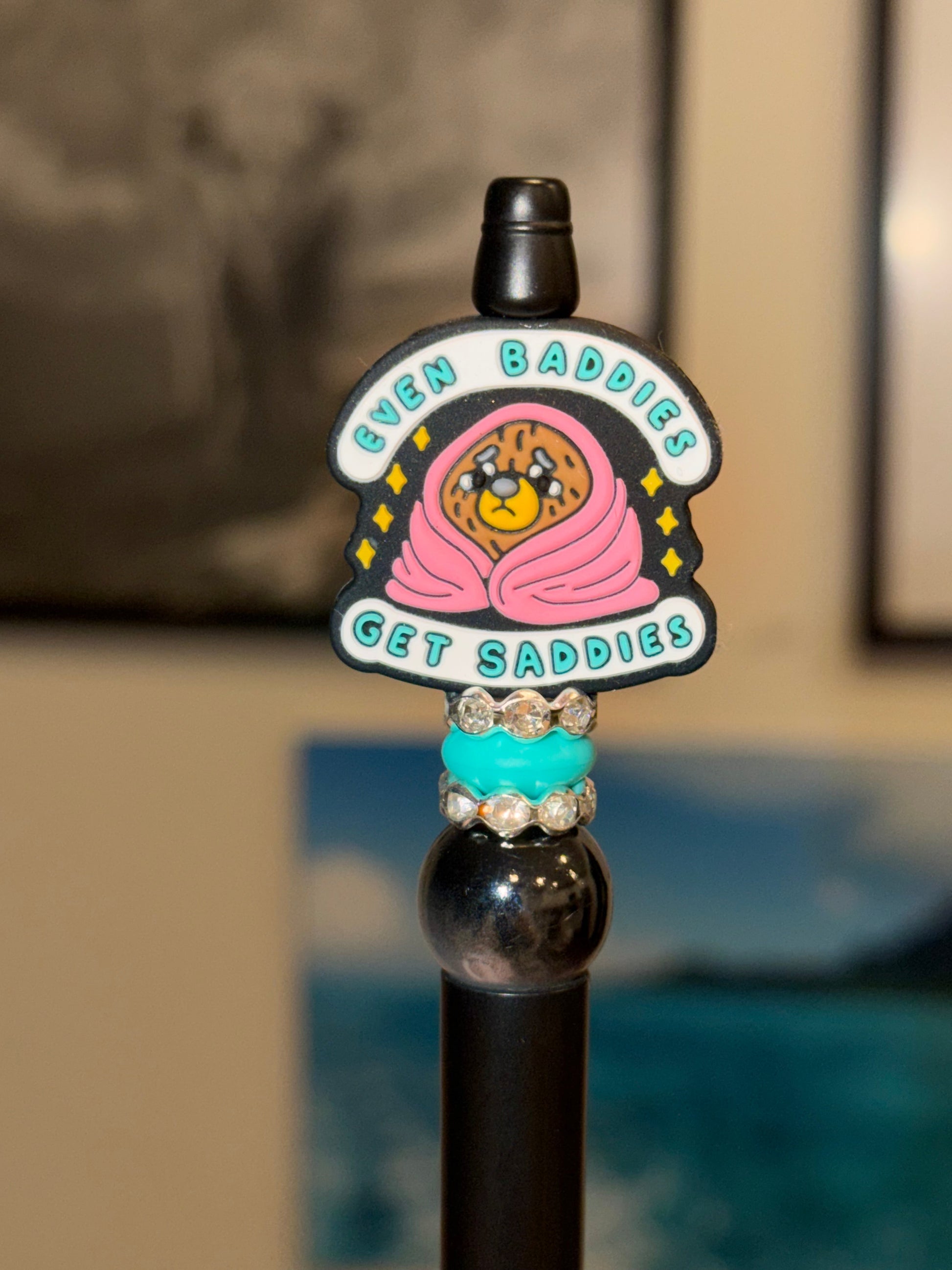 Even Baddies Get Saddies black beaded pen with crying teddy bear charm and turquoise bead