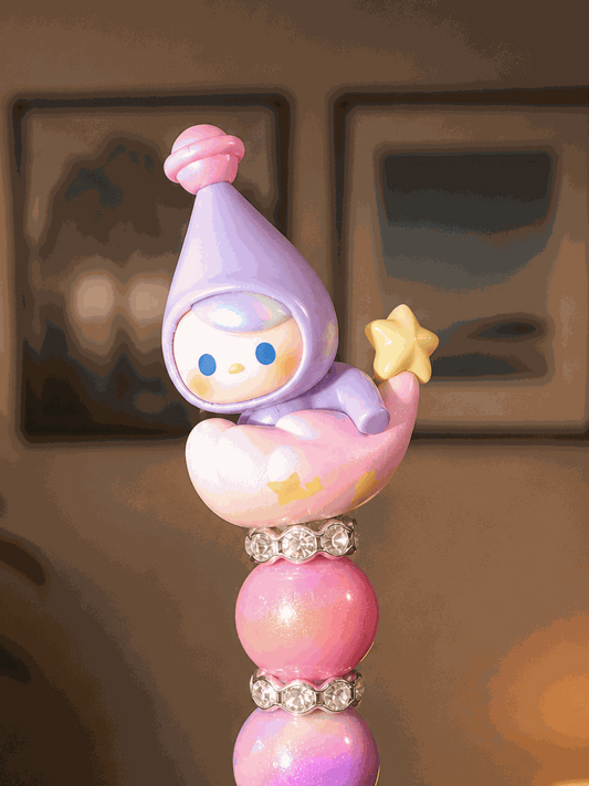 Authentic Pop Bean Pucky Goodnight beaded pen with pastel pink and purple beads and collectible Pucky character on crescent moon cloud
