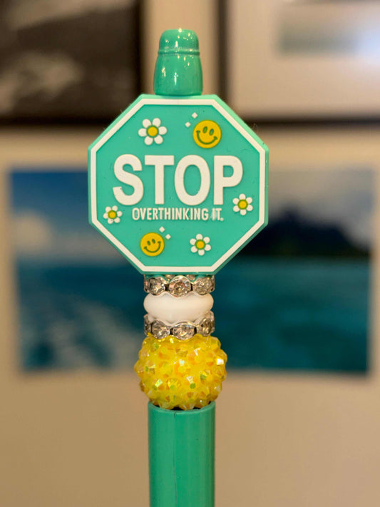 Teal pen with silicone beads and rhinestones, encouraging stop being hard on yourself message
