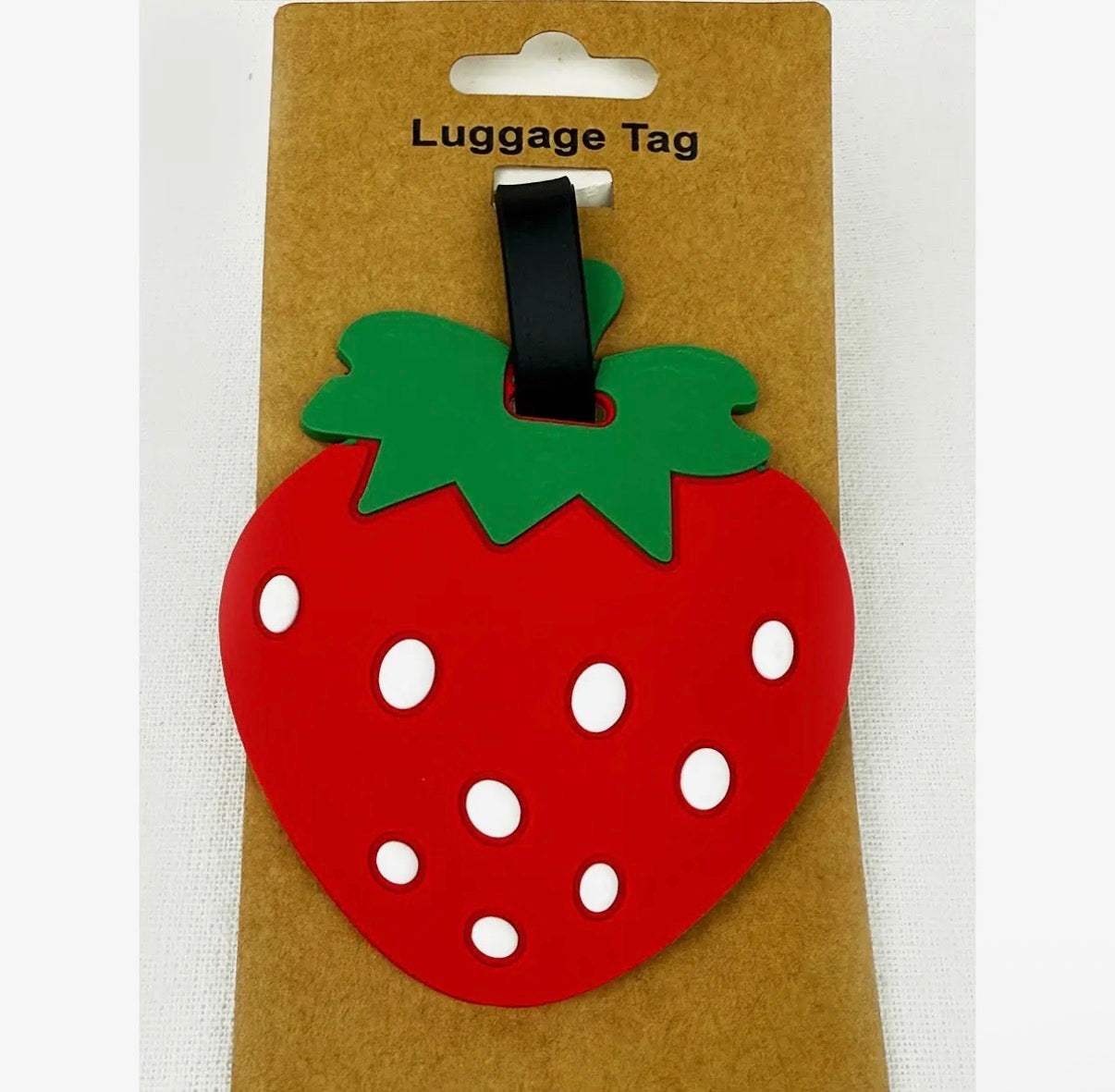 Strawberry and watermelon shaped brightly colored luggage tags made of silicone and plastic