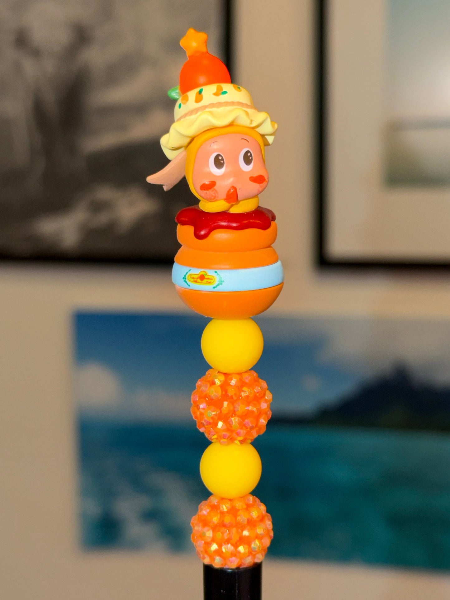 Twinkle Twinkle Pop Bean orange yellow beaded pen with cute collectible figure topper and matte yellow disco ball beads
