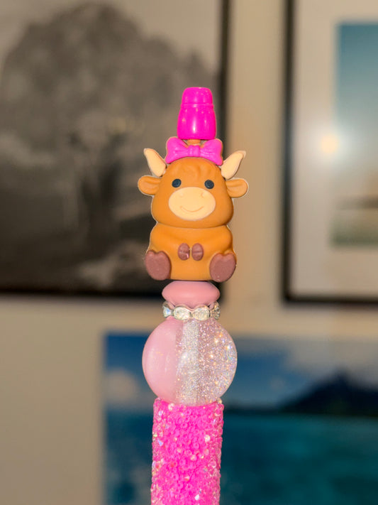 Scottish Highland Cow with a Bow on a Pink Sugar Bead Pen
