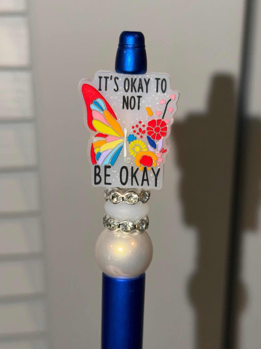 Blue pen with silicone and acrylic beads, rhinestones, and refillable black ink