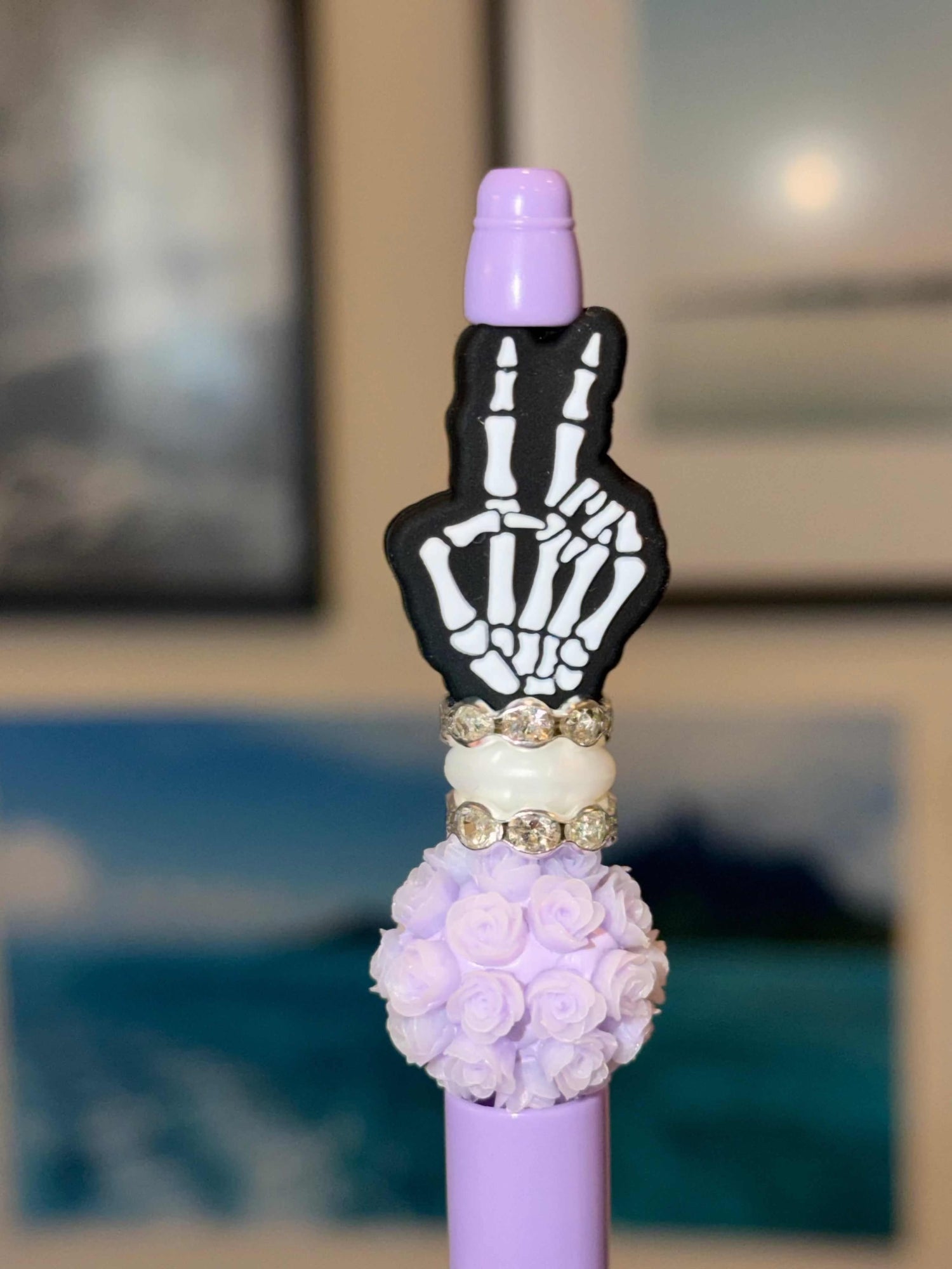 Peace Sign Skeleton design on purple pen with floral bead and rhinestones