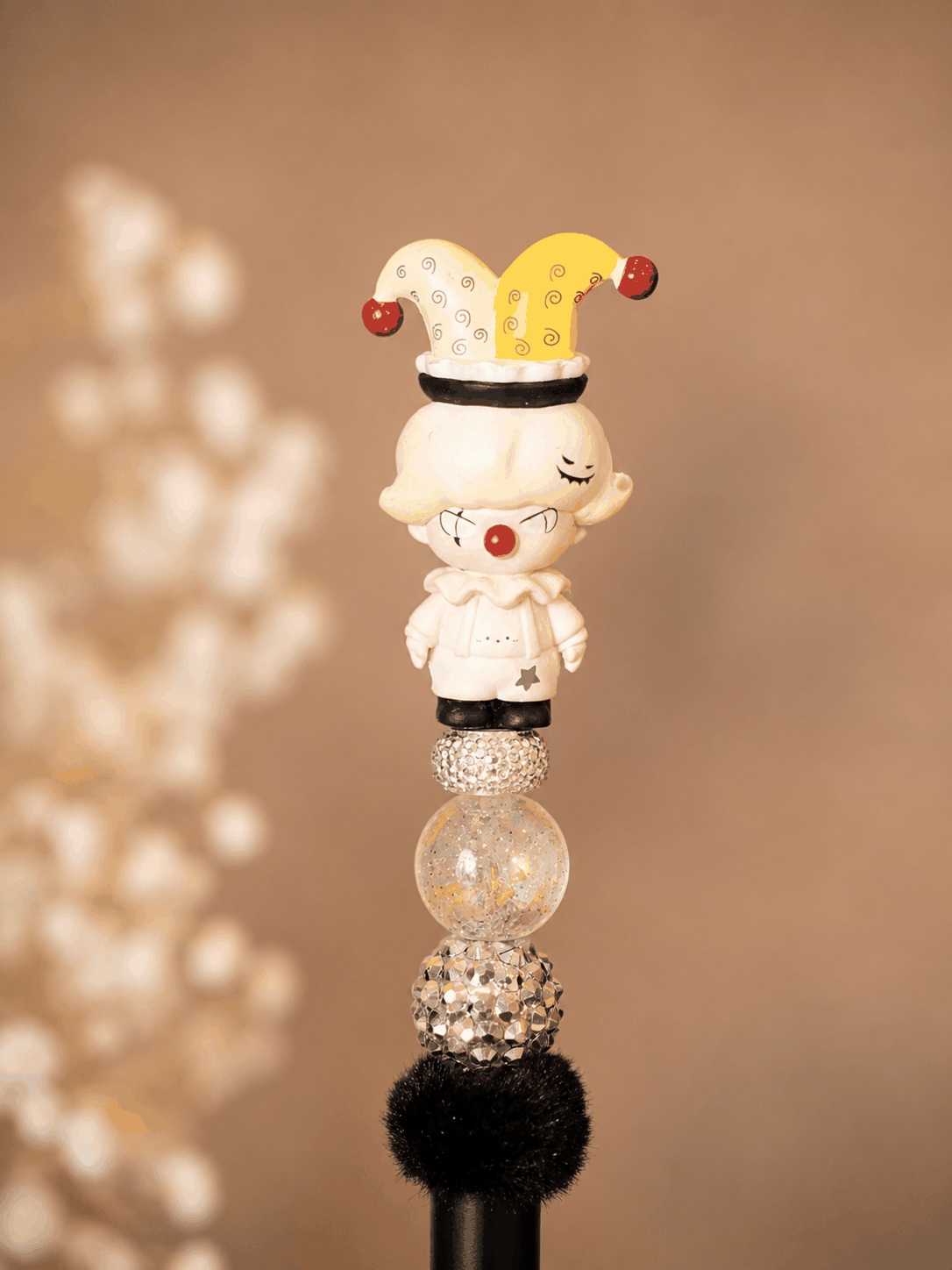 Dimoo Pop Bean Beaded Pen with clown character topper, crystal beads, black pom-pom, and black ink