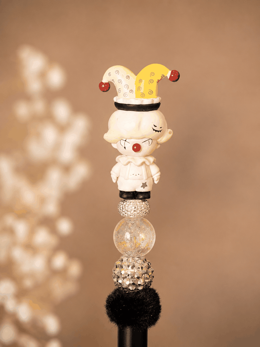 Dimoo Pop Bean Beaded Pen with clown character topper, crystal beads, black pom-pom, and black ink