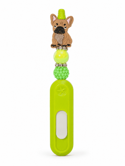 Neon green retractable box cutter decorated with a French Bulldog charm, textured beads, and rhinestone accents. Perfect for opening packages and crafting projects.