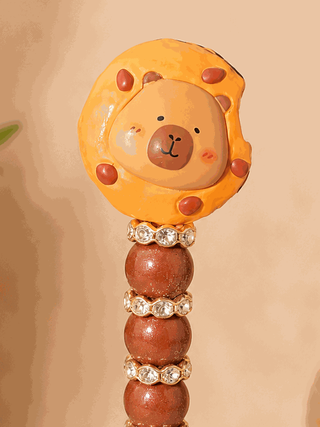 Handmade Capybara Cookie Beaded Pen with rhinestone accents and cute bear topper for kawaii stationery fans