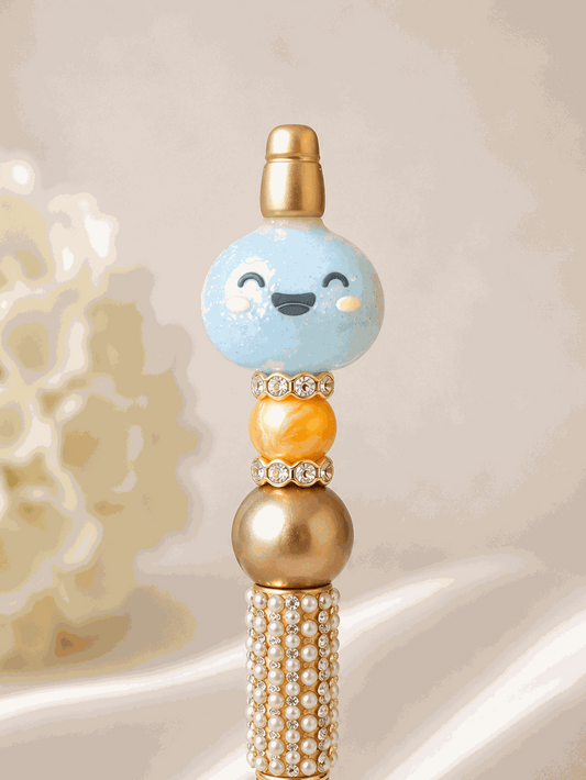 Kawaii glitter dumpling pen with blue glitter bead, gold and pearl accents, elegant cute desk accessory