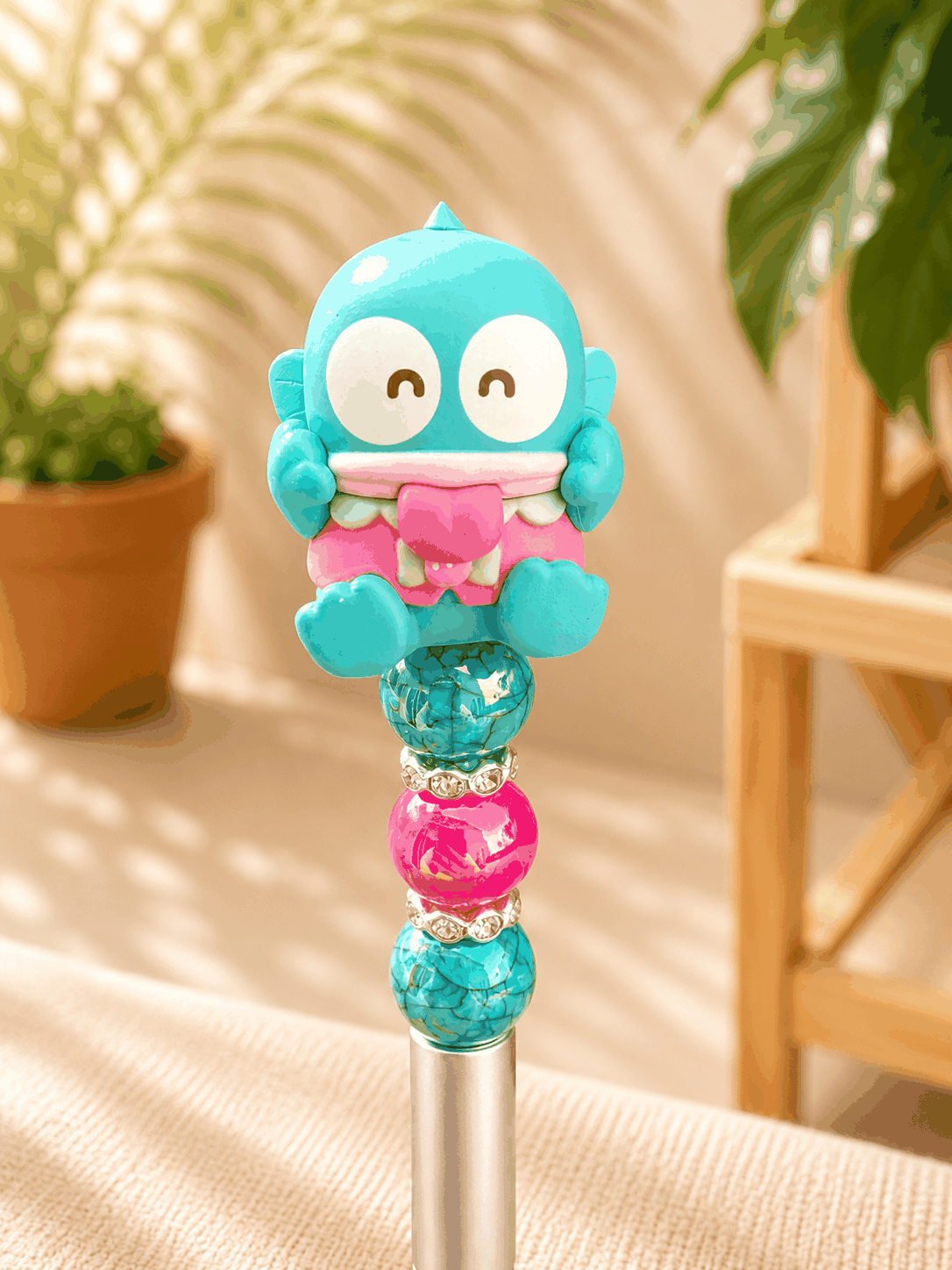 Authentic Sanrio Hangyodon handmade beaded ballpoint pen with turquoise and pink rhinestone accents