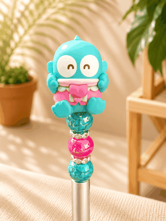 Authentic Sanrio Hangyodon handmade beaded ballpoint pen with turquoise and pink rhinestone accents