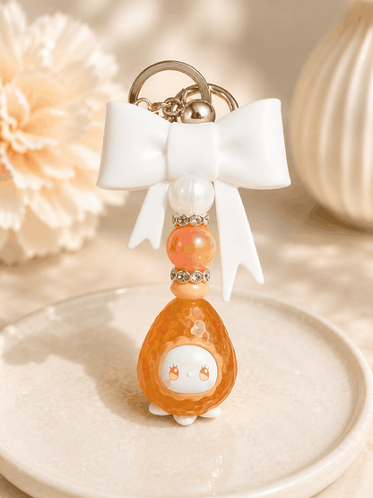 Emma Strawberry Bean Bag Charm keychain featuring translucent strawberry design with white bow and pastel beads