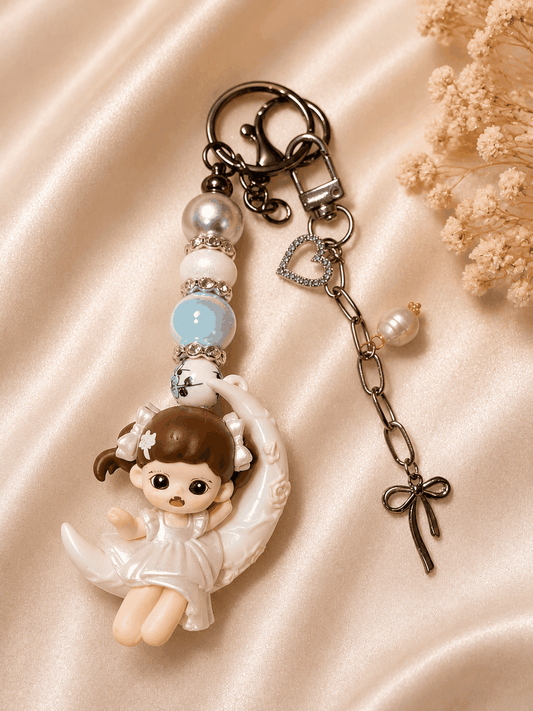 Baby Zora Bean Moon Bag Charm with rhinestones on crescent moon accessory