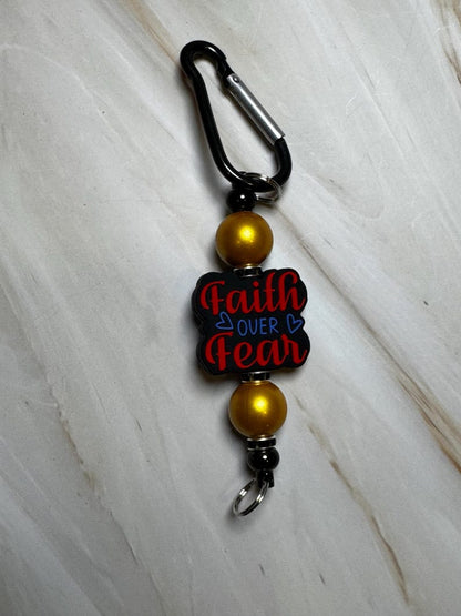 Red, Blue, Black, and Gold Faith Over Fear Keychain with Black Carabiner Clip