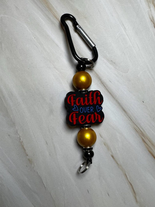 Red, Blue, Black, and Gold Faith Over Fear Keychain with Black Carabiner Clip