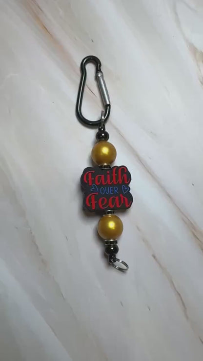 Red, Blue, Black, and Gold Faith Over Fear Keychain with Black Carabiner Clip